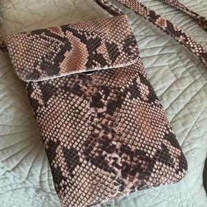 Genuine Leather cross body purse.